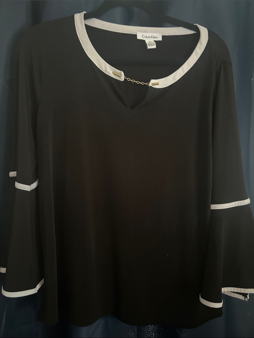 Calvin Klein Black Blouse with White Trim and Gold Accent